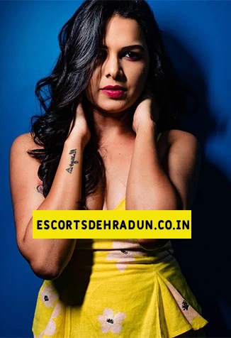 Stunning Best Almora call girl in vibrant yellow dress with bold pose and tattoo